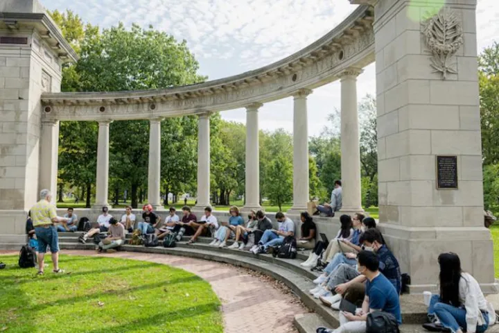 Class sitting outdoors on campus at Oberlin College